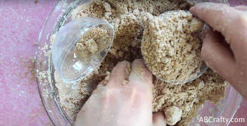 Filling the bath bomb molds with chocolate mixture