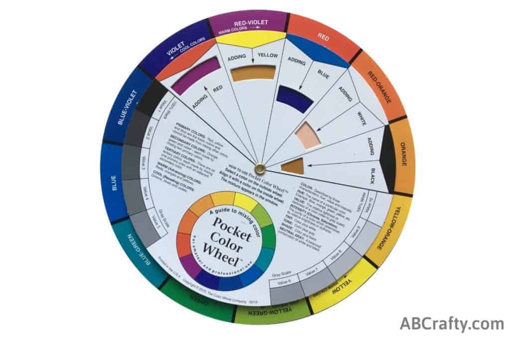 color wheel showing adding yellow to red-violet