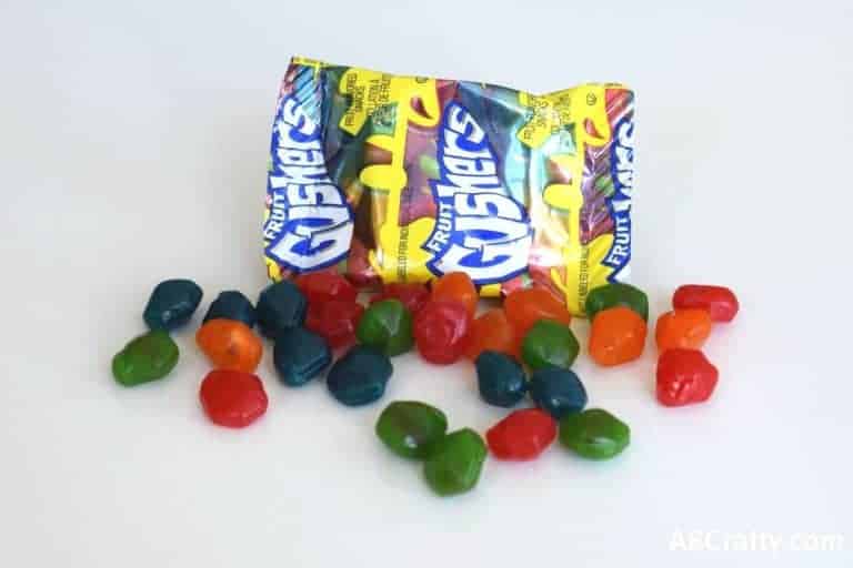 Gushers candy in front of the bag
