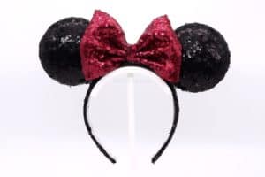 Featured Image - DIY Classic Light Up Minnie Ears. It's a black sequined headband with a red sequined bow, creating the classic Disney Minnie Mouse ears