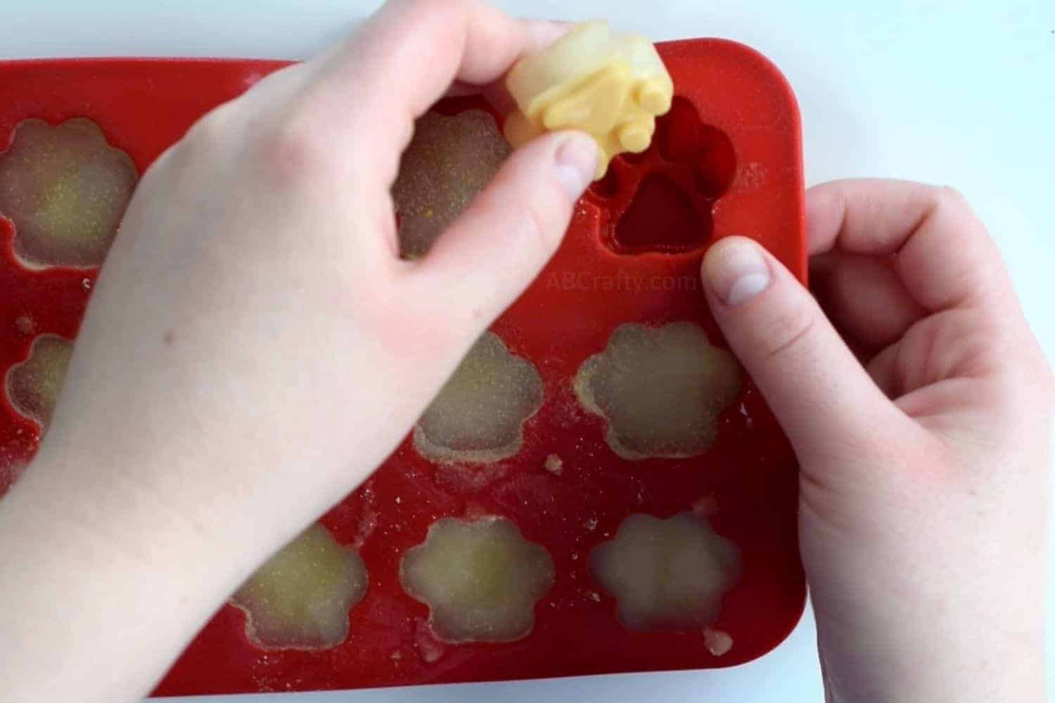 Removing frozen dog popsicle from mold