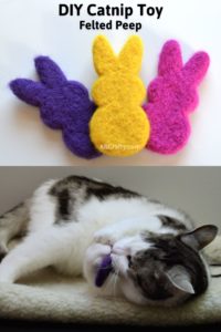 Yellow, purple, and pink needle felted bunny peeps made of wool and a white cat with black and grey spots playing with the purple bunny. Title says "DIY Catnip Toy - Felted Peep"