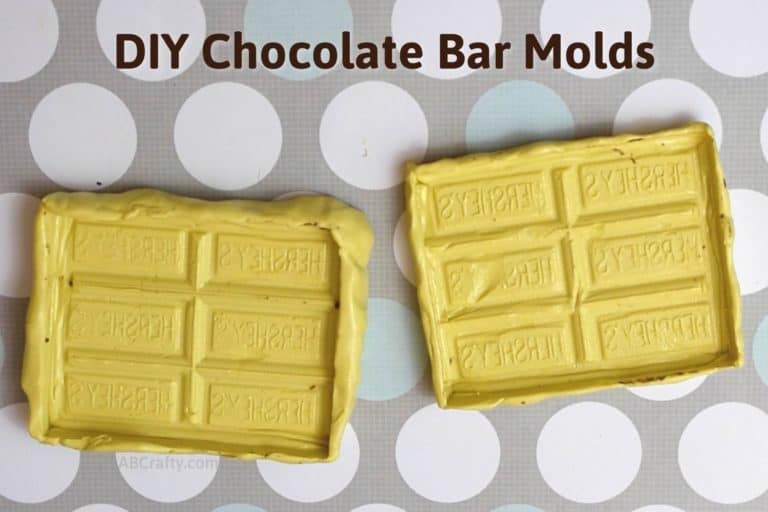 two yellow homemade hershey bar molds on top of a polka dot background with the text 'diy chocolate bar molds' on top