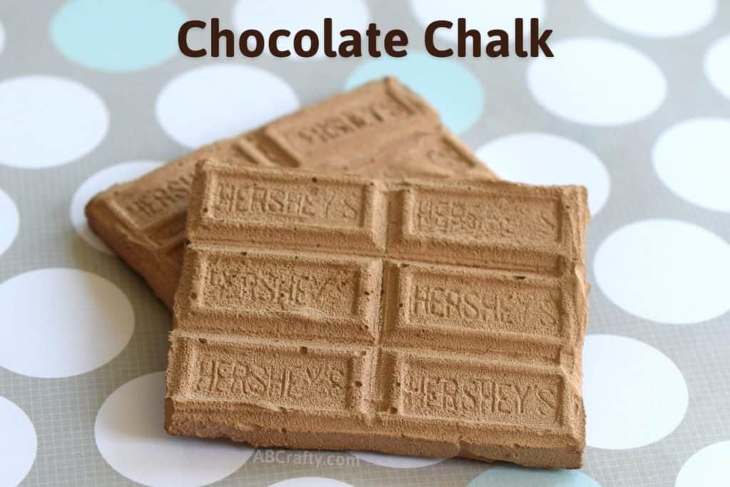 two chocolate sidewalk chalk pieces stacked on top of each other with the title 'chocolate chalk' on top