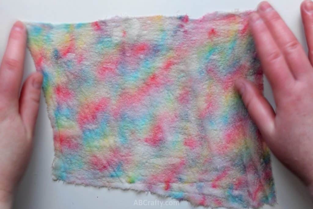 Finished margilan silk dyed with rainbow candy sticks so that it looks like tie dyed silk