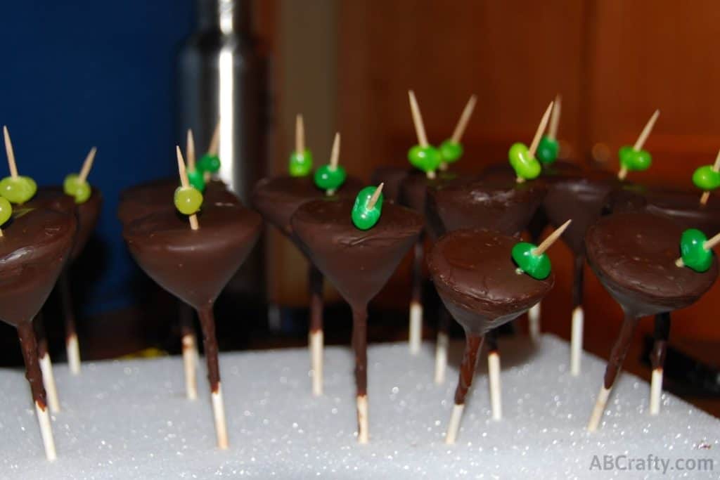 Row of martini glass cake pops pressed into a foam block or cake pop stand