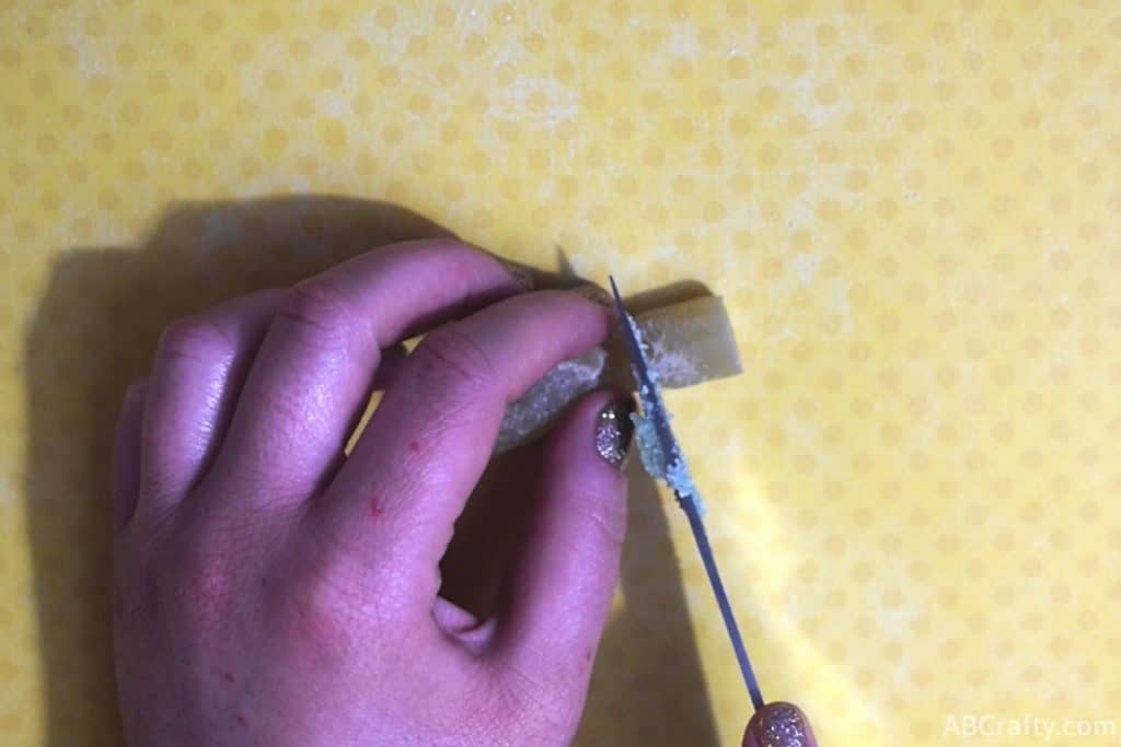 cutting off part of a rope candy