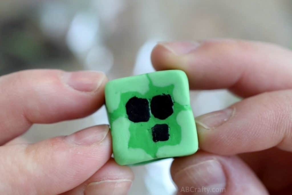 holding a finished minecraft slime block eraser