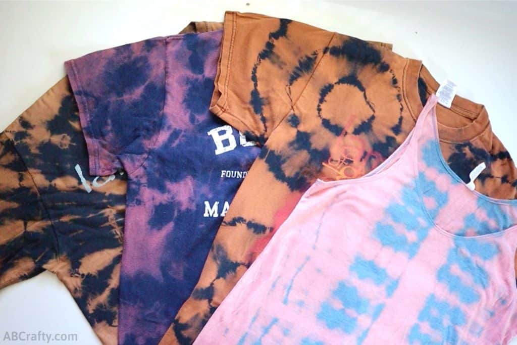 3 bleach tie dye t shirts and 1 bleach tie dye tank top