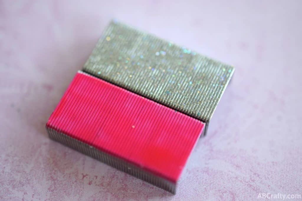 glitter and pink staples next to each other