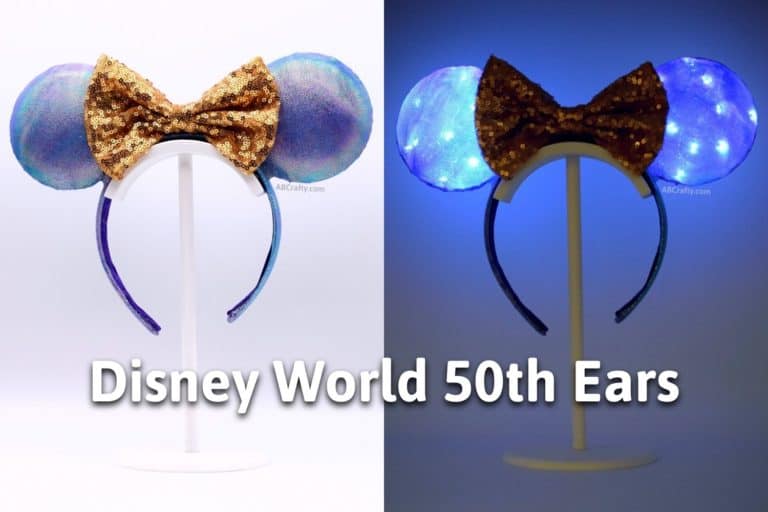 diy purple and blue earidescent mickey mouse ears both in the light and lit up with the title disney world 50th anniversary ears