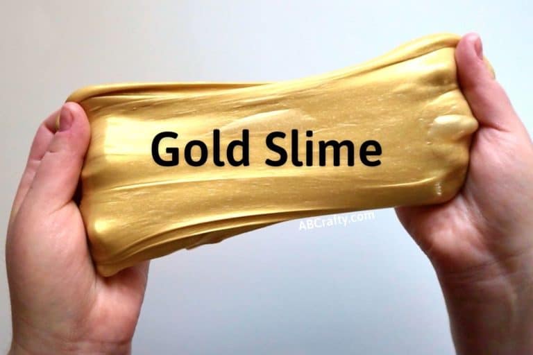 hands holding metallic slime with the title "gold slime"