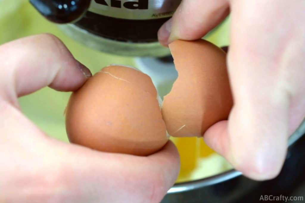 cracking an egg into an stand mixer