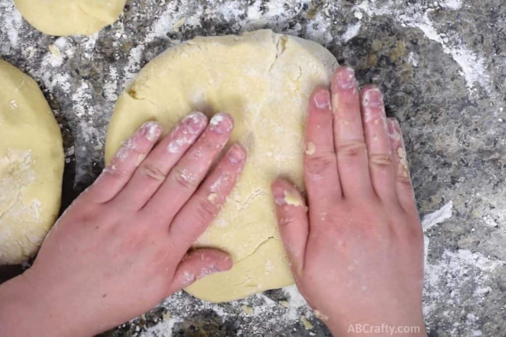 shaping sugar cookie dough into a disc