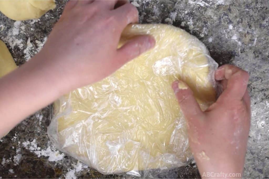 wrapping sugar cookie dough in plastic wrap