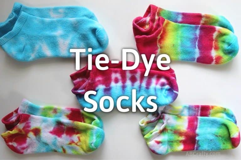5 piles of tie dyed socks in blue, red and blue, and rainbow with the title of tie dye socks