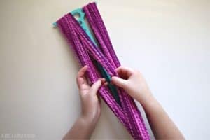 dividing the pink yarn in two sections