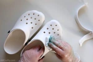rubbing acetone onto crocs with the straps off