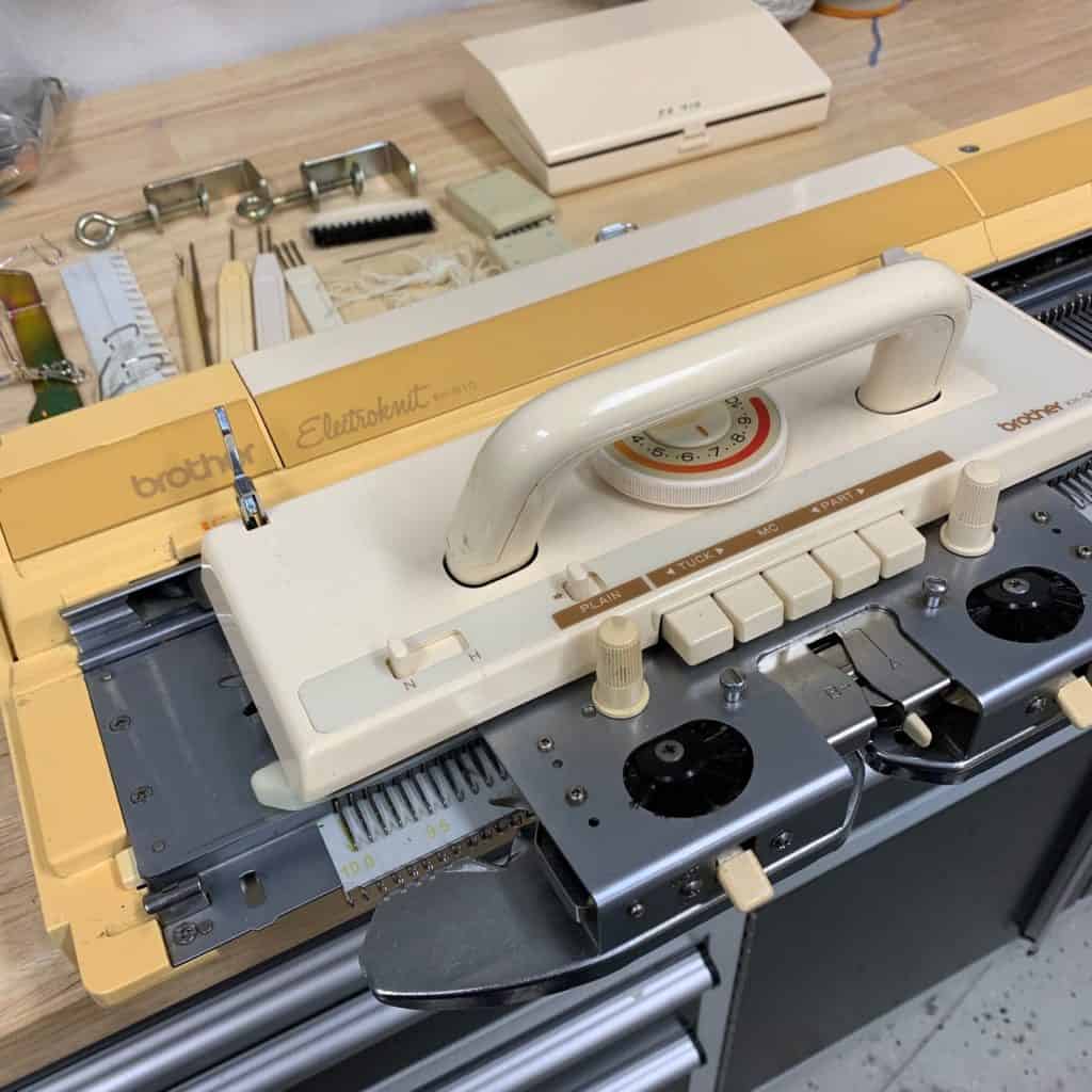 open knitting machine showing the brother electroknit kh910