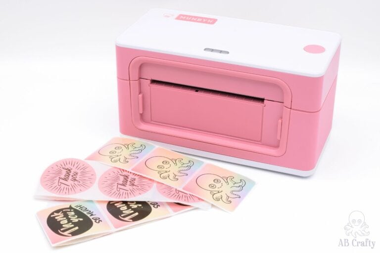 munbyn thermal printer 941b in pink with printed stickers, including the AB Crafty logo