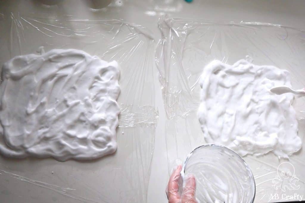 shaping shaving cream mixture into rectangles on plastic