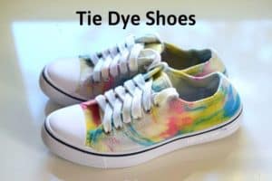 finished tie dye sneakers with rainbow tie dye pattern and white laces with the title "tie dye shoes"