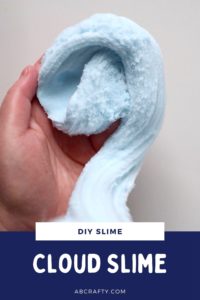 drizzling blue soft slime into a hand so it forms a spiral with the title "diy slime, cloud slime"