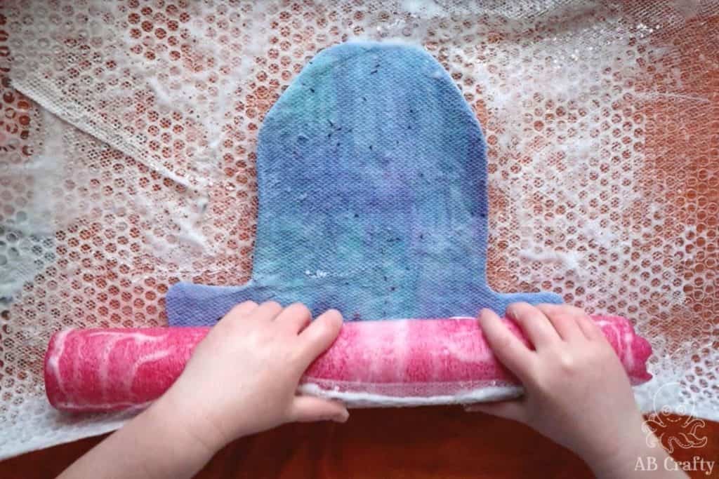 placing a pool noodle at the bottom of the felting project