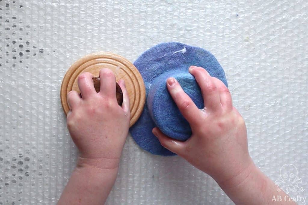 using a palm washboard from heartfelt silks on the brim of the felted mini hat