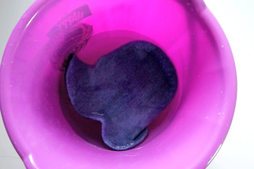 wet felted hat soaking in water and vinegar