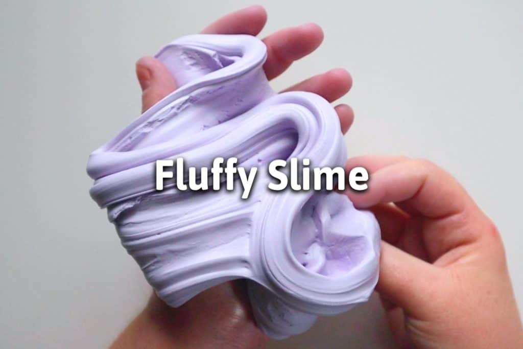 purple puffy slime drizzled into the hand with the title "fluffy slime"