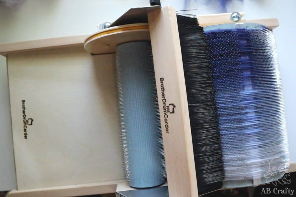 navy wool blended from darkest to lightest on a drum carder