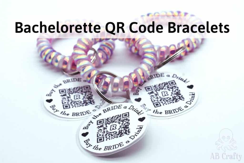 3 finished pink buy the bride a drink venmo bracelets with the title "bachelorette QR code bracelets"