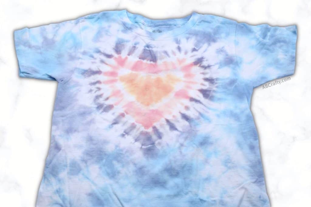 finished pastel tie dye shirt with a tie dye heart design