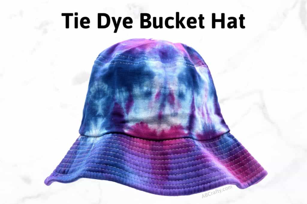 blue, purple, and pink dyed bucket hat with the title "tie dye bucket hat"