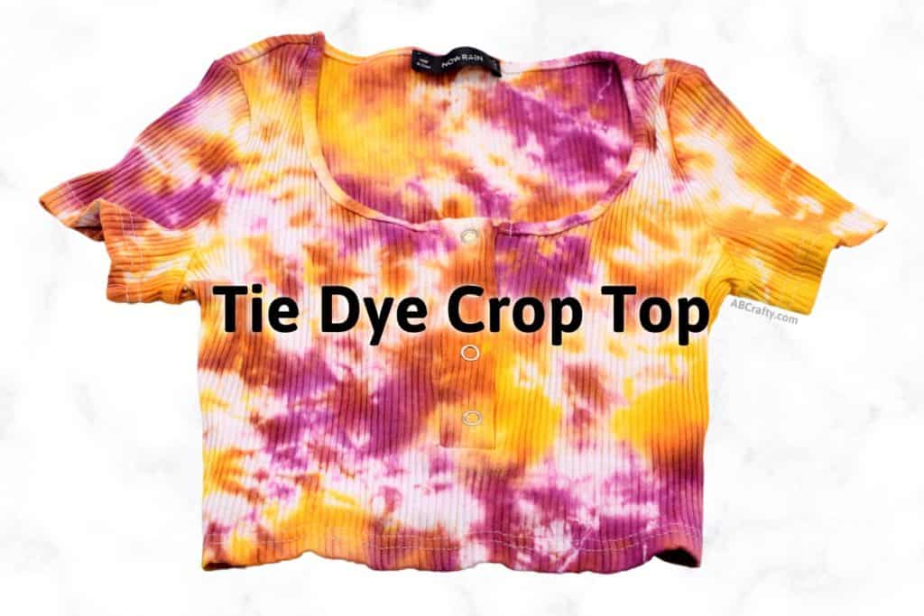 pink, orange, and yellow dyed crop top with the title "tie dye crop top"