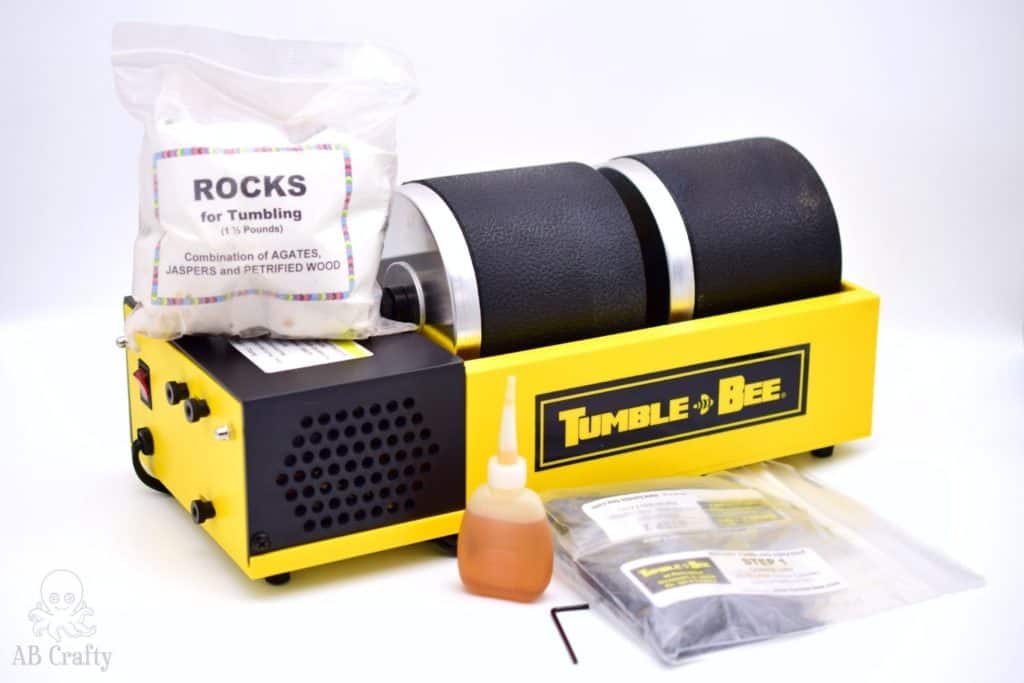 tumble bee rock tumbler kit with half of the stones and grit