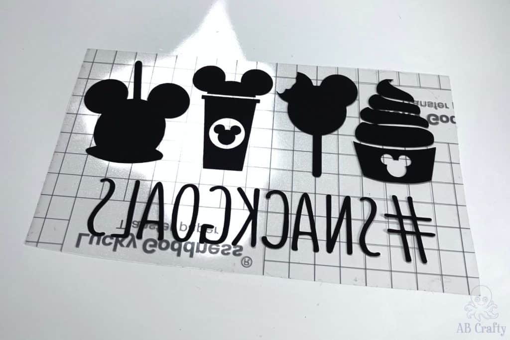 disney snacks design in black sublimation paper already weeded