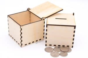 open laser cut box and laser cut coin box with coins in front