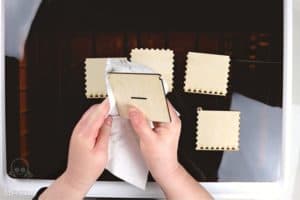 cleaning the sides of the cut plywood pieces