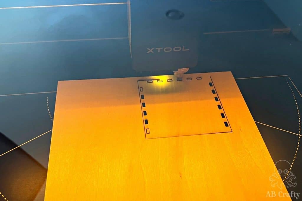 xtool m1 cutting out the laser cut propagation station pieces out of basswood