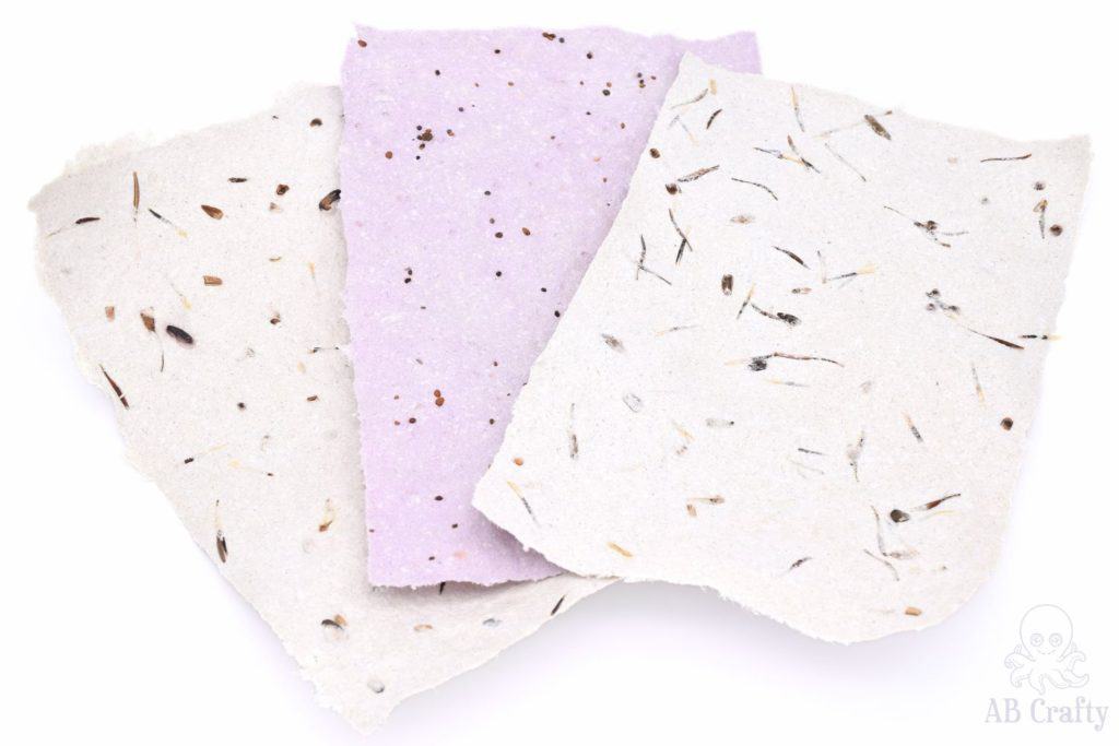 3 sheets of finished seed paper - 2 white ones and one purple